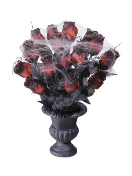 Florero con rosas rojas y telarañas