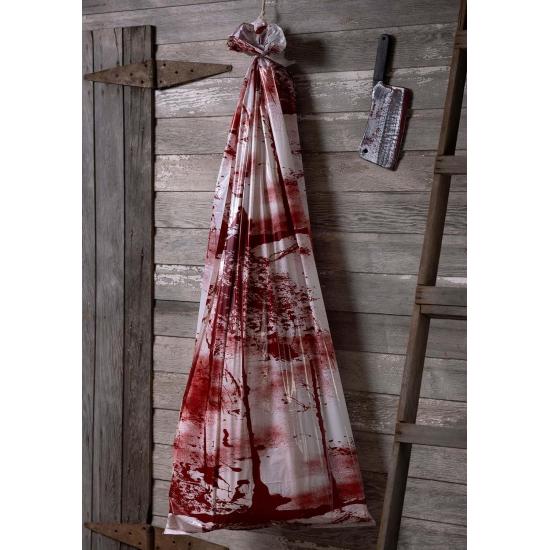 Cuerpo ensangrentado en una bolsa